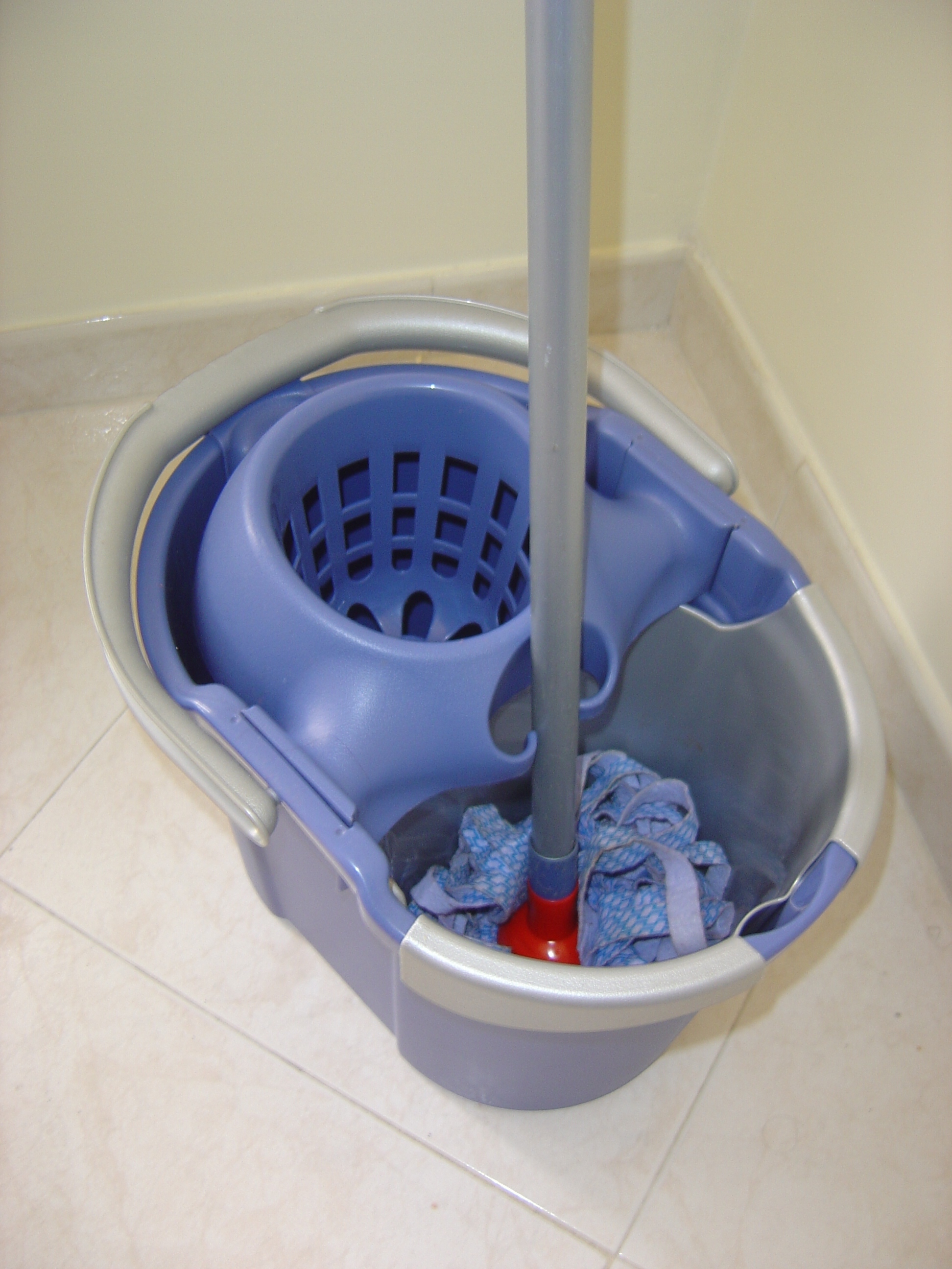 Janitors bucket with mop